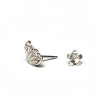 Load image into Gallery viewer, Silver butterfly and flower stud earrings on a white background