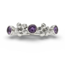 Load image into Gallery viewer, Silver ring with purple gemstones on a white background