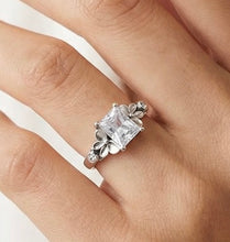 Load image into Gallery viewer, Silver ring with a large diamond on a finger