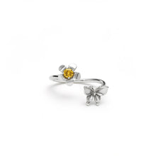 Load image into Gallery viewer, Silver ring with a yellow gemstone and butterfly design on a white background